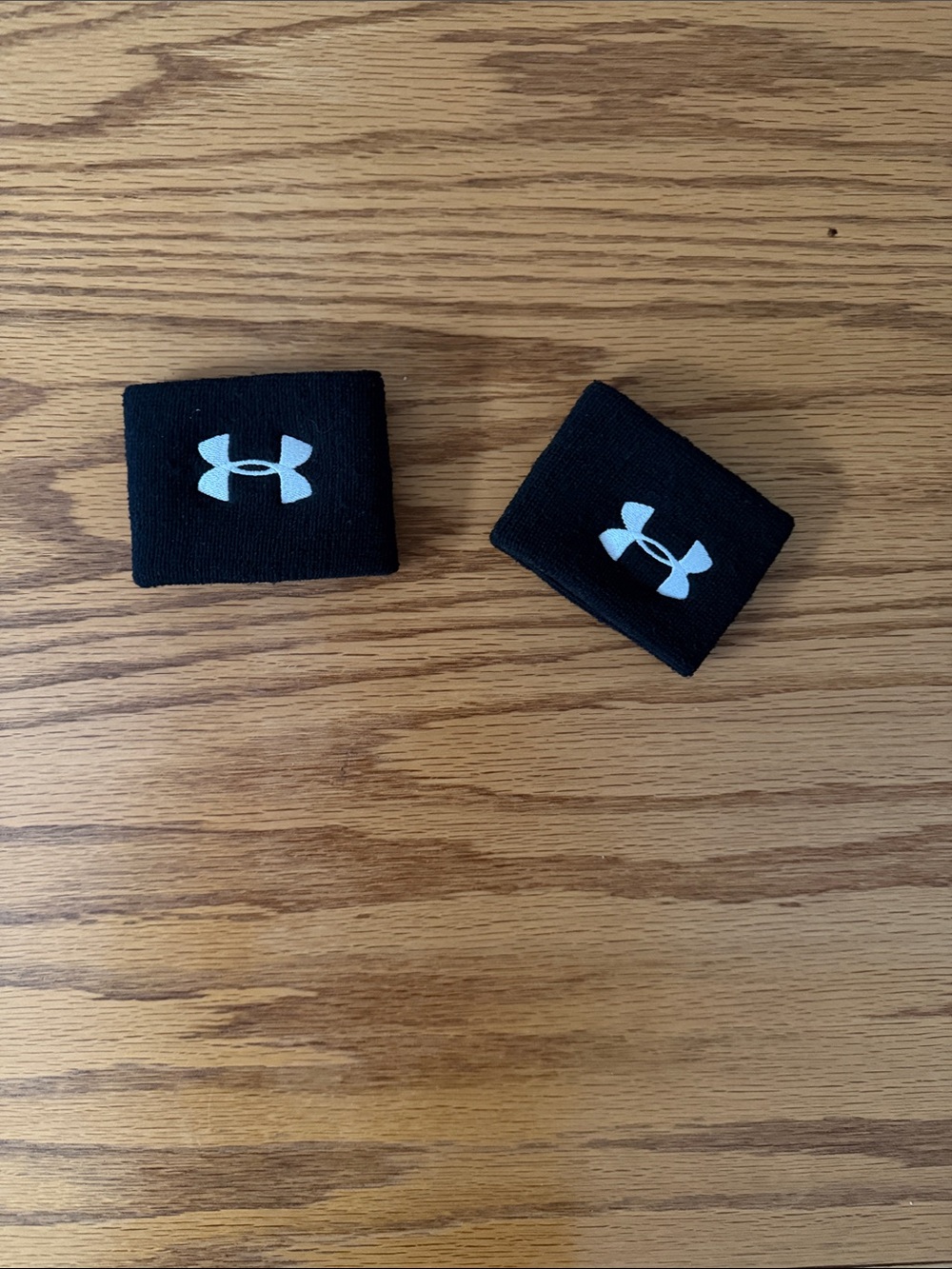 Under Armour Black Wrist Sweatbands with White Logo (Pair)
